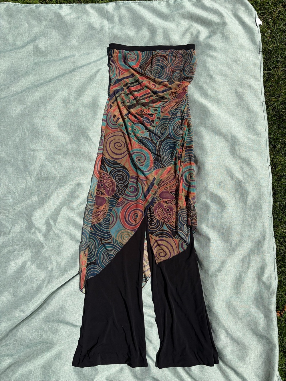 Janine strapless dressy jumpsuit with flowing overlay.
